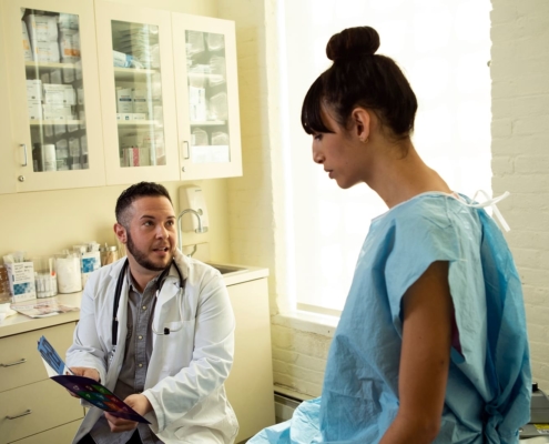 Photo of a patient speaking to a doctor