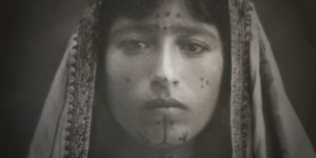 Still shot from Mariam's Tattoos: The Afterlives of a Humanitarian Photograph