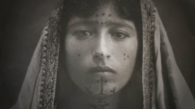 Still shot from Mariam's Tattoos: The Afterlives of a Humanitarian Photograph