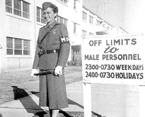 MP Rita Charette enforces the no-men policy, 1958. Bunny McCulloch Papers, UCLA Library Special Collections.
